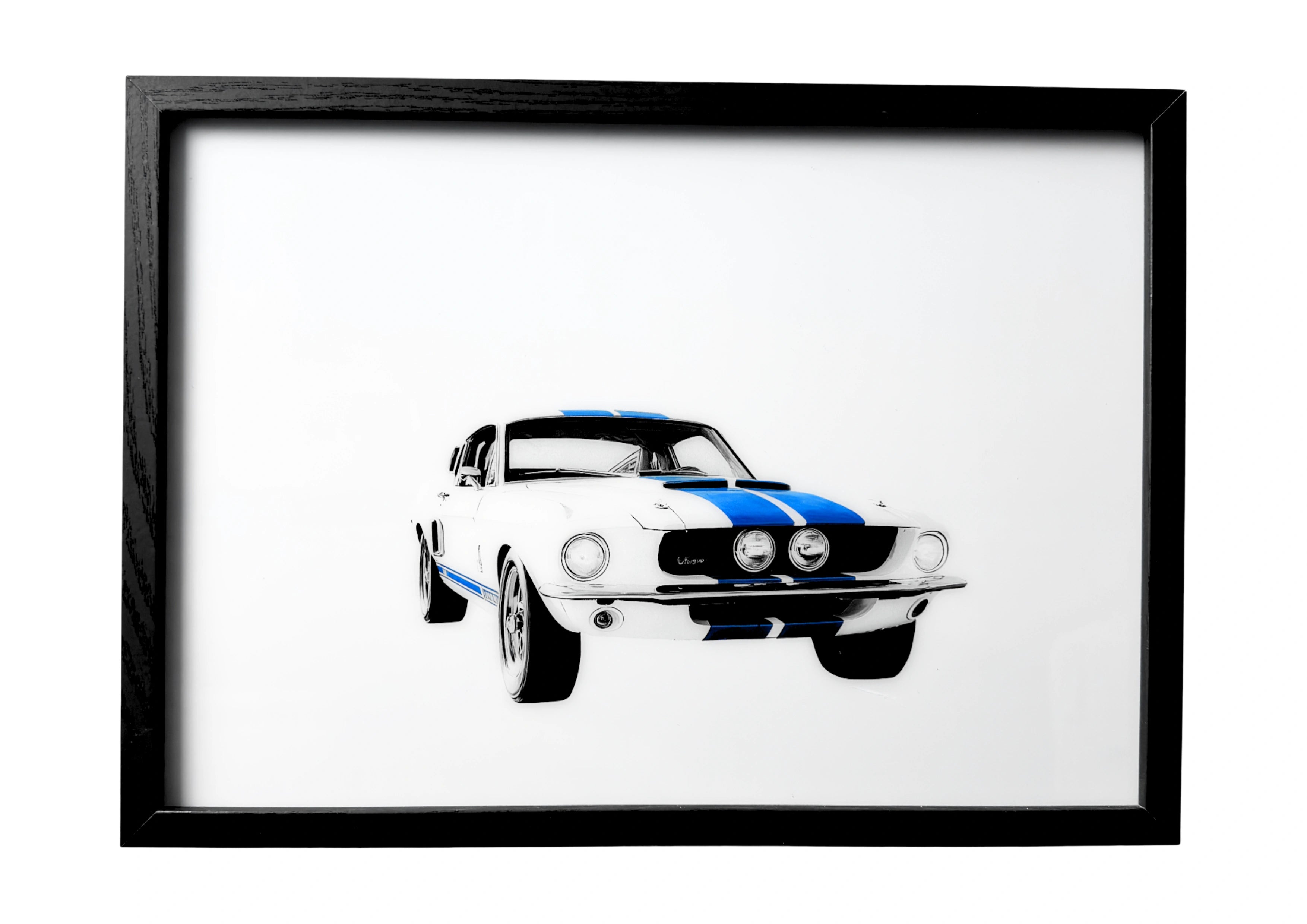Minimalist white 1967 Shelby Mustang GT500 wall art with blue stripes resting on a coastal beach beneath a glowing sunset. A serene automotive classic.