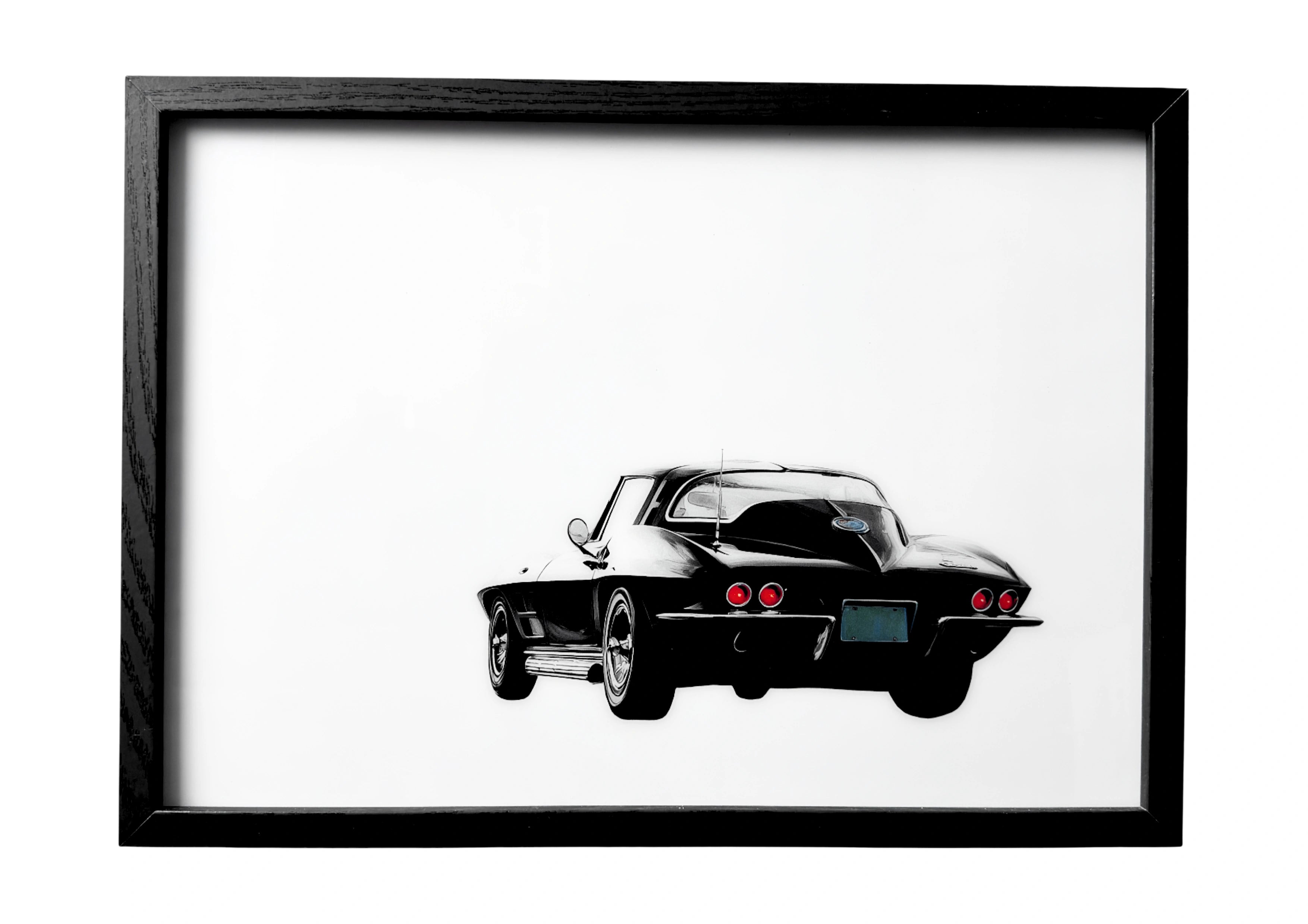 Minimalist black 1963 Chevrolet Corvette Sting Ray wall art viewed from behind on a Miami street with pastel skies and palm silhouettes. A serene automotive classic in evening light.