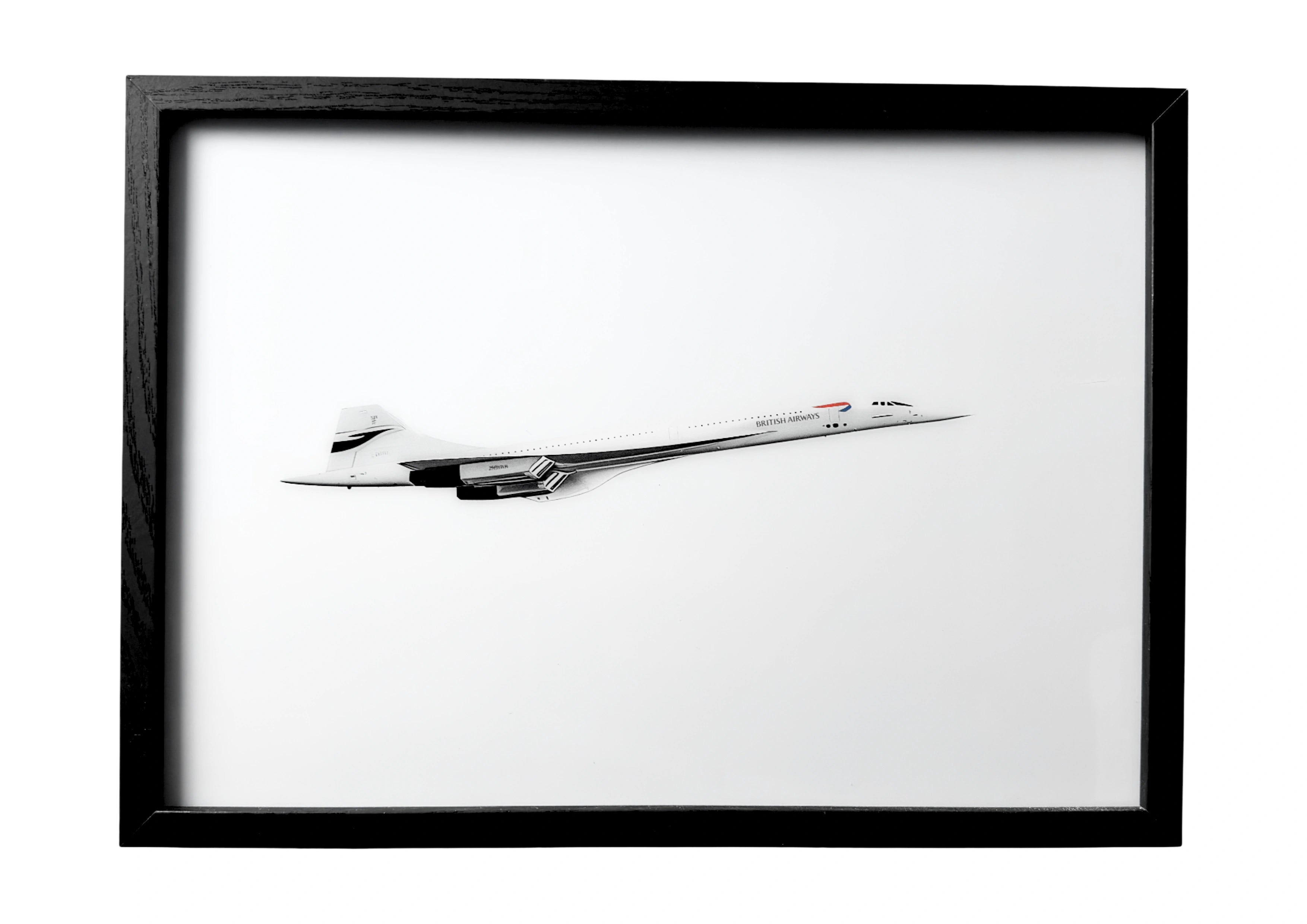 British Airways Concorde wall art with white fuselage and silver wings. A framed tribute to British aviation innovation.