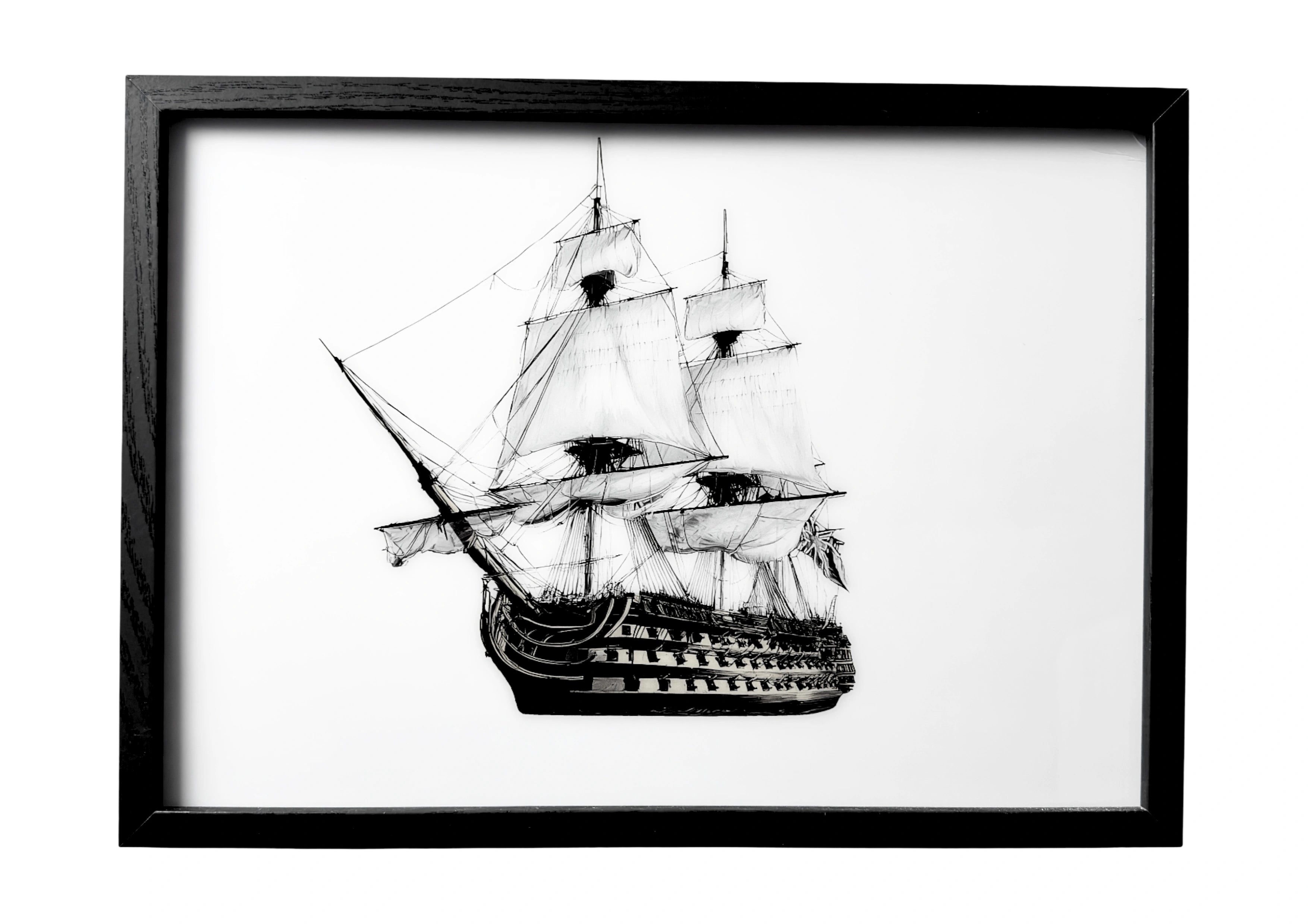 HMS Victory wall art in black and gold with detailed sails. A framed tribute to British naval craftsmanship.