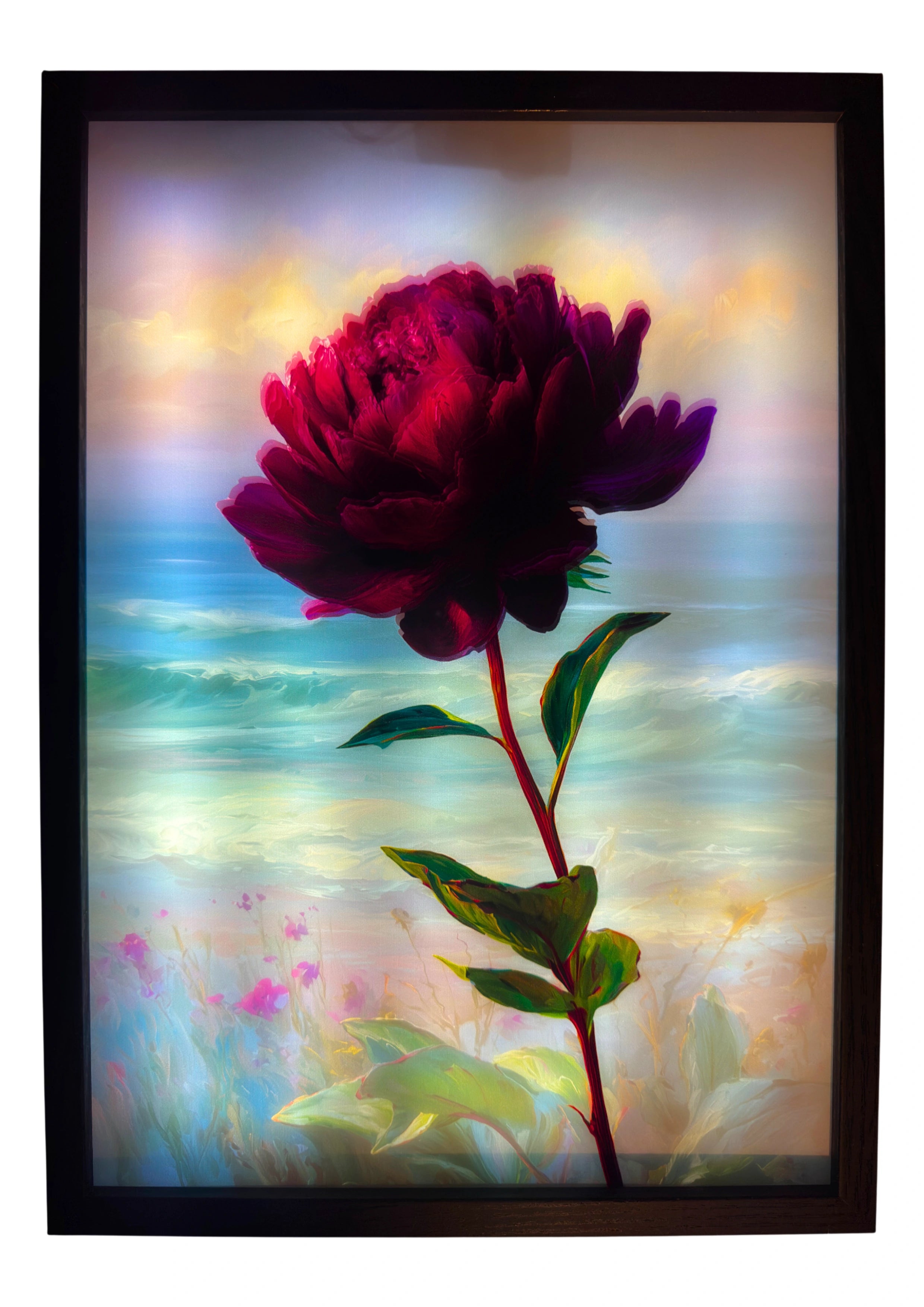 Peony light up wall art glowing with magenta petals against a shoreline background and ocean waves, illuminated for ambient lighting.