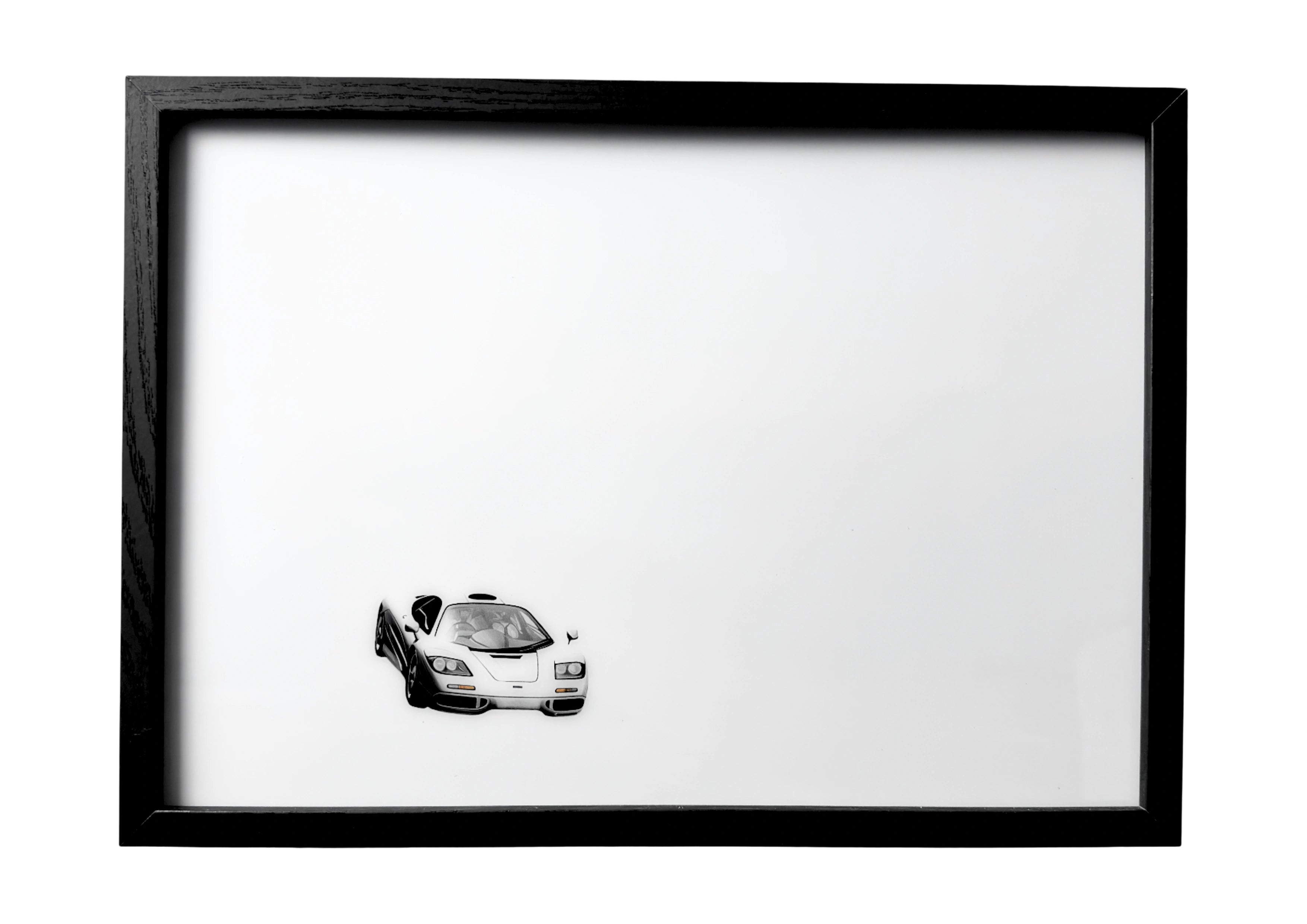 1992 McLaren F1 wall art in silver, front three-quarter view, calm and composed.