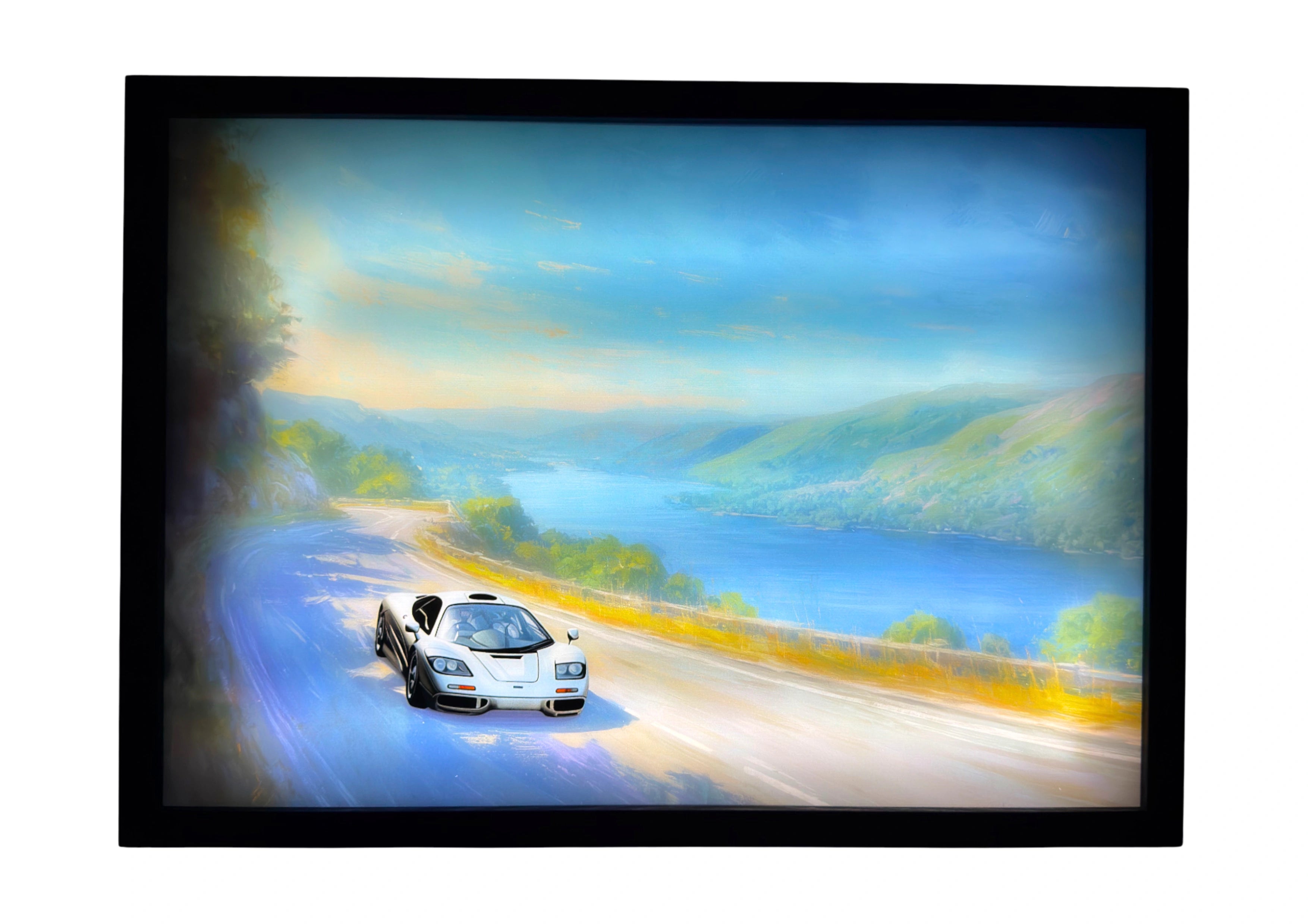 1992 McLaren F1 LED light up wall art glowing along Highland roads, silver body reflecting teal skies and warm sunlight.