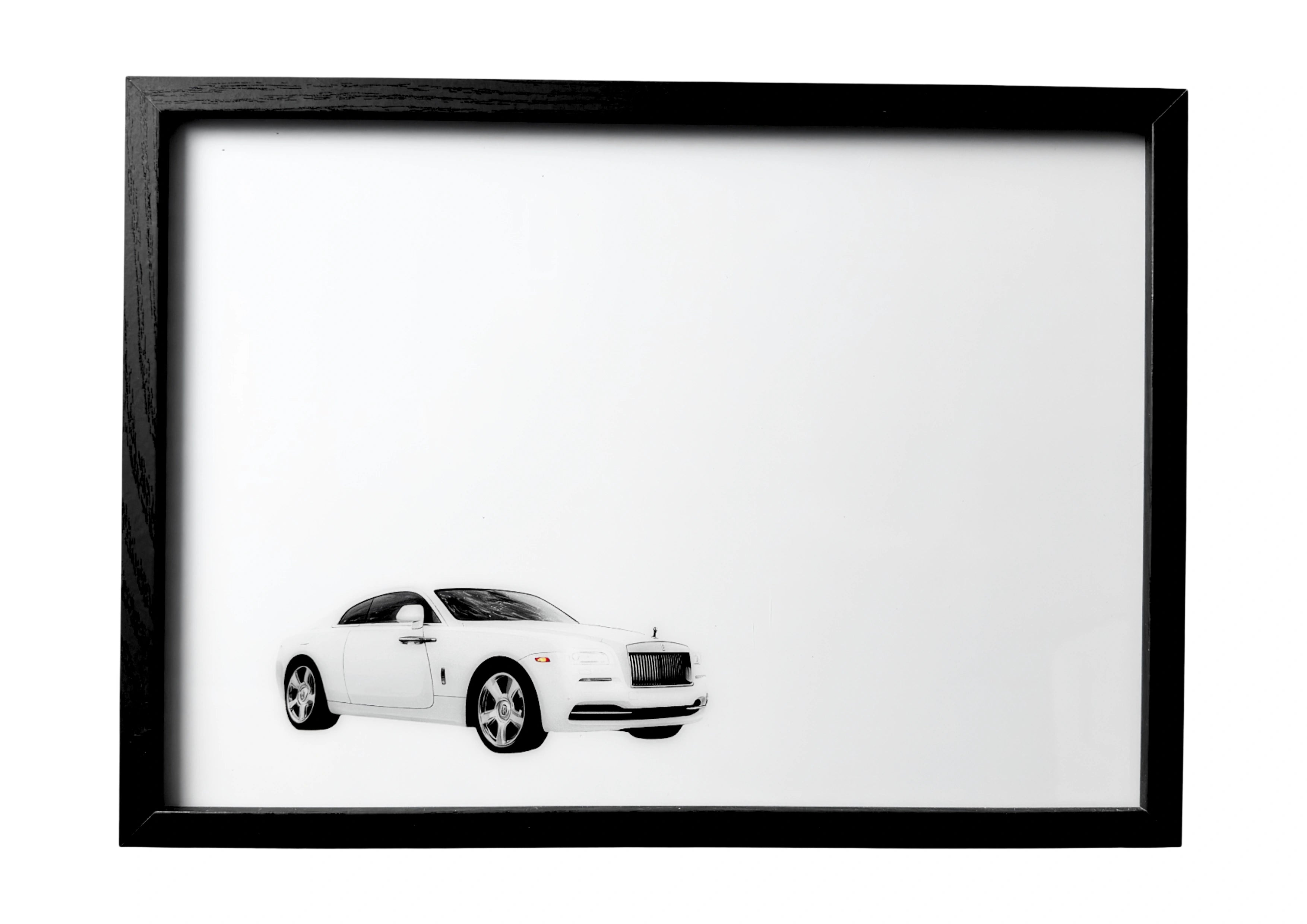 White 2013 Rolls-Royce Wraith wall art with chrome detail in calm daylight, refined and minimal.