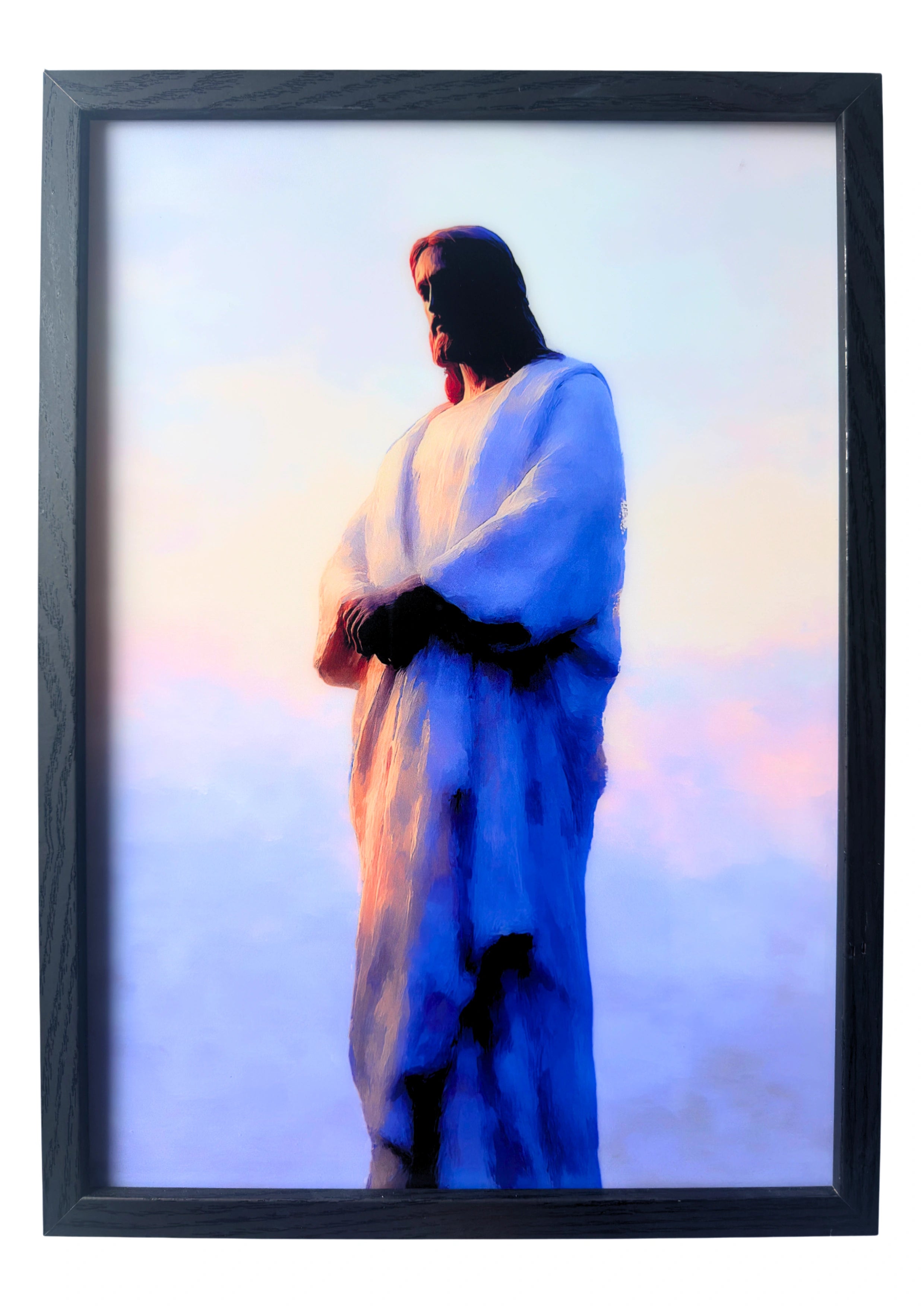 Jesus Christ wall art detailed with soft ivory hues, standing beneath a pale morning sky. A framed artwork symbolising peace and devotion.