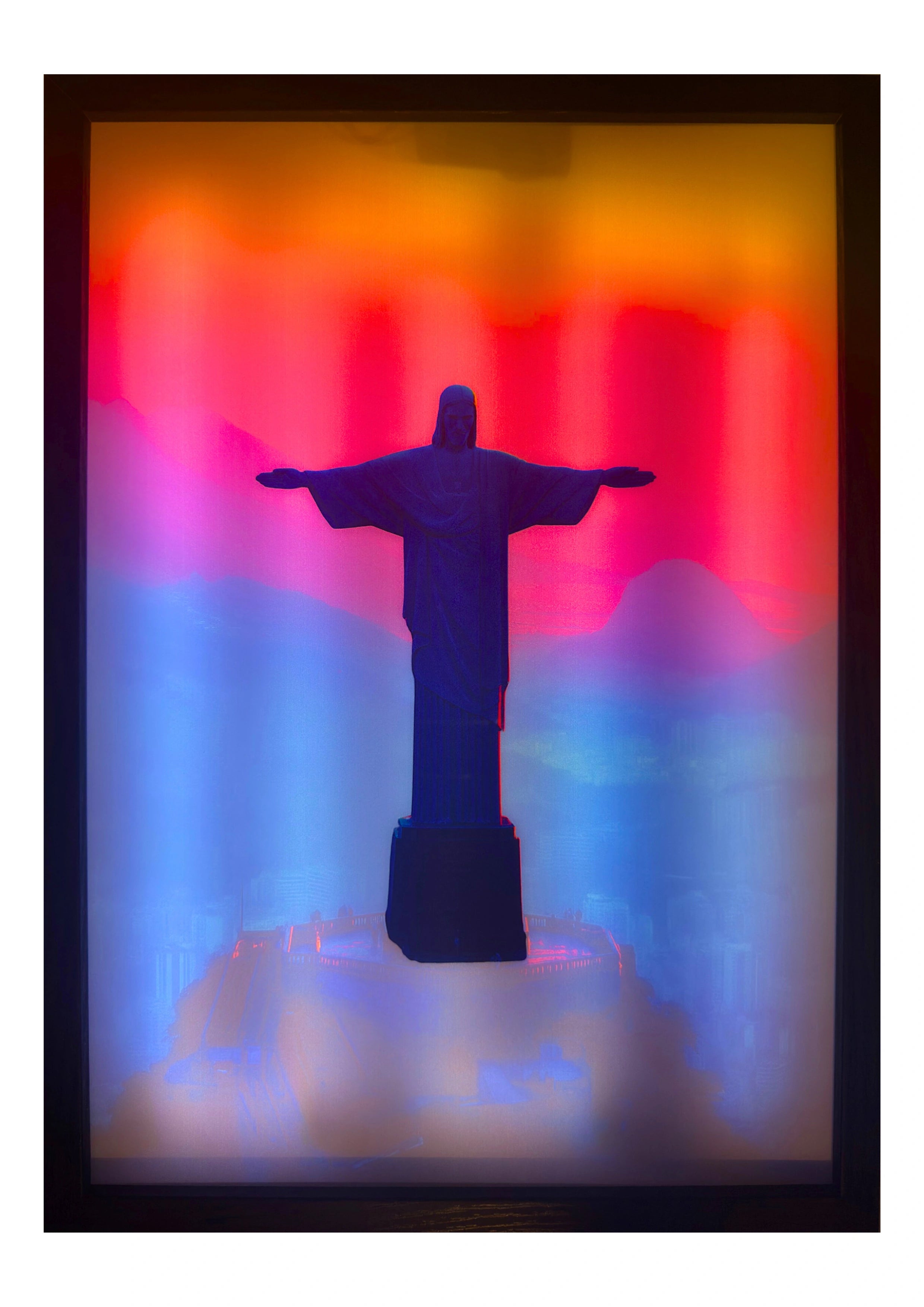Christ the Redeemer LED light up wall art glowing in rose, amber, and gold light — a framed artwork of Christian hope and renewal.