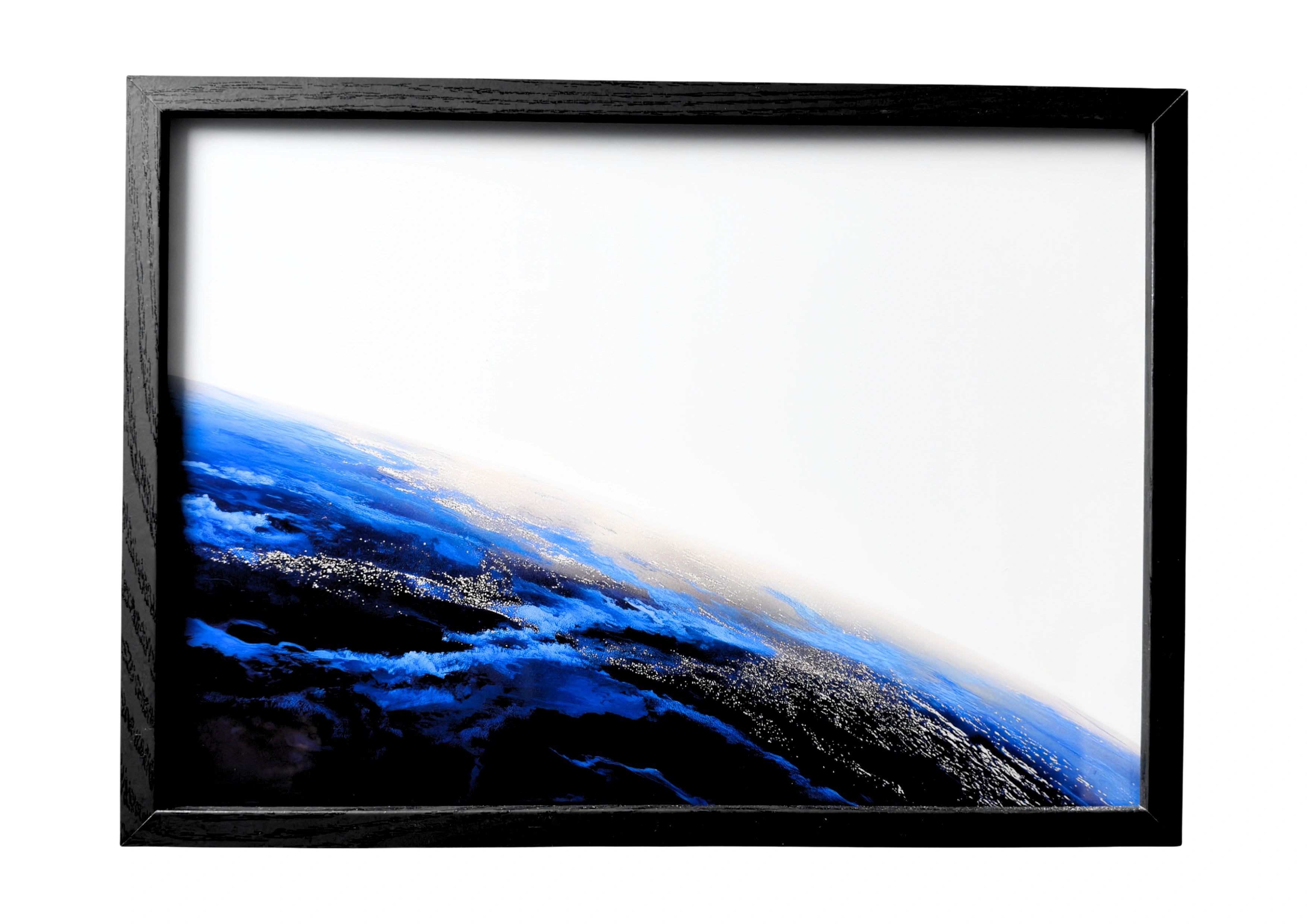 Minimalist quarter Earth wall art showing the planet’s curved horizon in soft blue tones. A serene celestial composition.