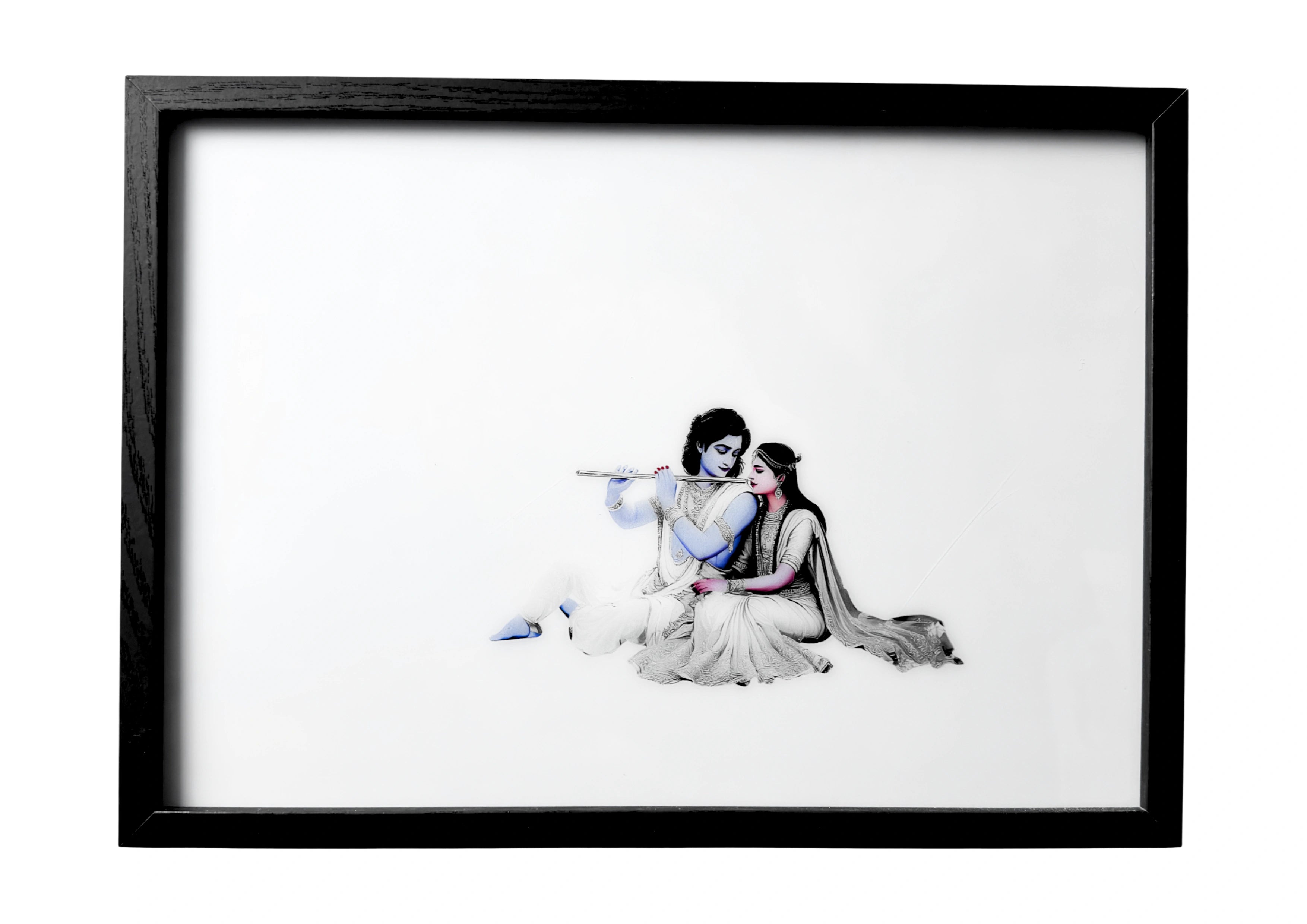 Radha and Krishna wall art detailed with soft blue and rose hues, sitting together beneath a tree. A framed artwork symbolising divine love and serenity.