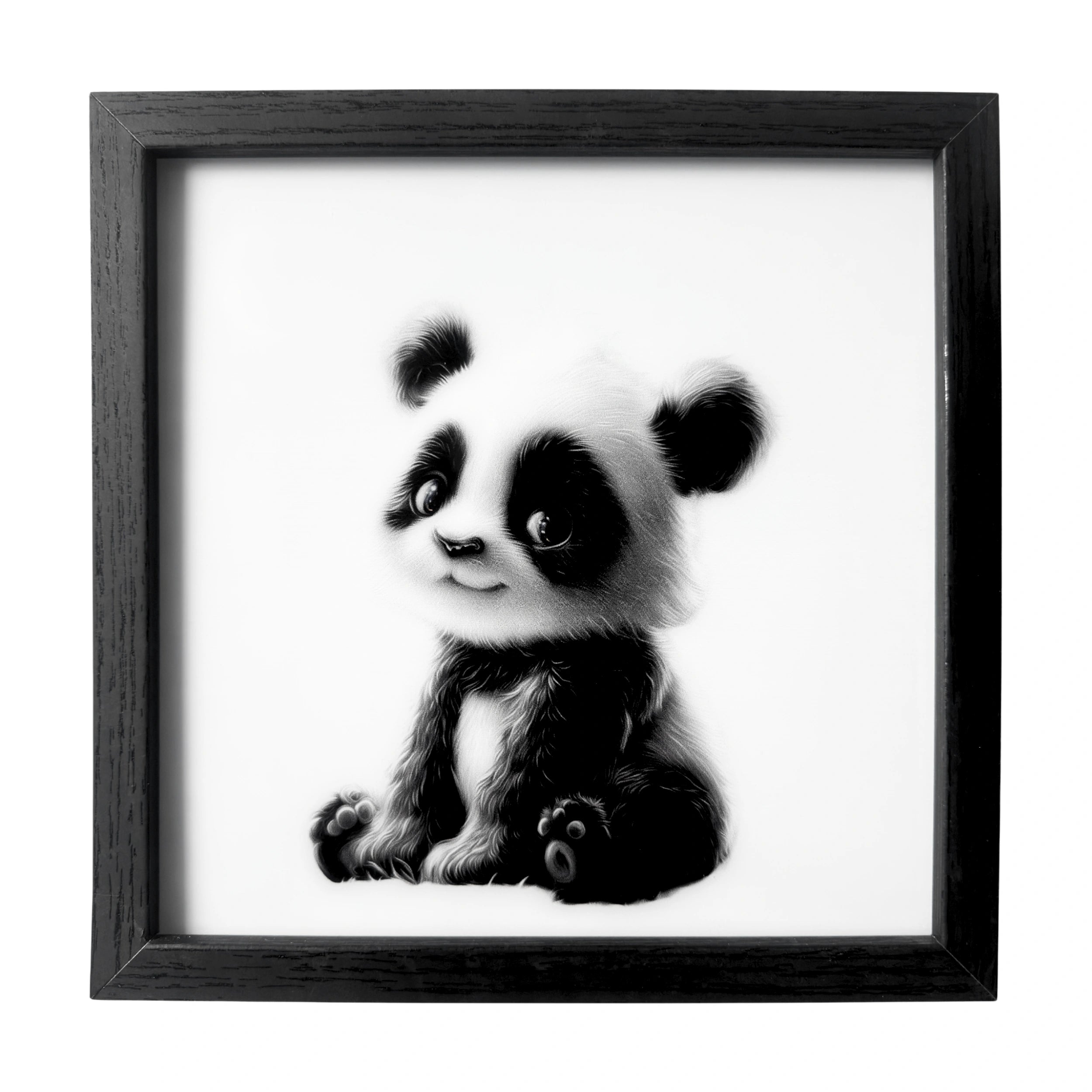 Minimalist baby panda wall art with warm brown eyes. A framed gentle nursery companion.